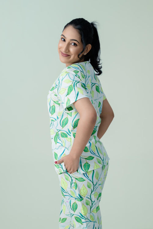Side view of botanical print medical scrub top for healthcare professionals